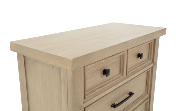 Light wood dresser with a smooth rectangular top, featuring two small drawers with black square knobs and a larger drawer below with a black handle.