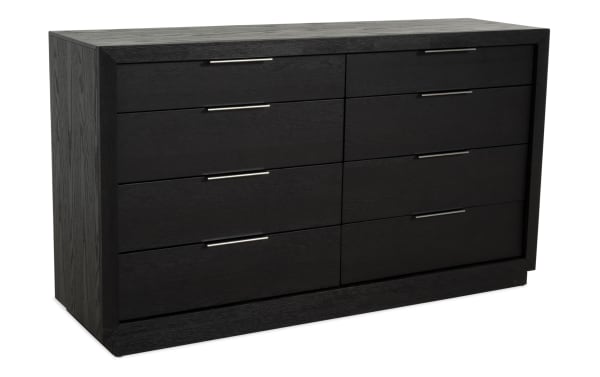 Modern black wooden dresser with eight drawers, sleek metal handles, and a sturdy frame, ideal for bedroom storage and organization.