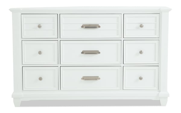 Sunset Cove White 9 Drawer Dresser in coastal style, made of white MDF with slatted drawer fronts, brushed metal handles, felt-lined top drawers, and removable jewelry tray.