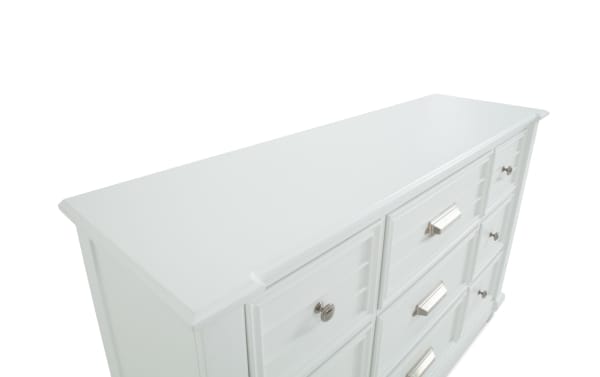 Sunset Cove White 9 Drawer Dresser in coastal style with slatted MDF construction, silver hardware, and felt-lined top drawers for organized storage.