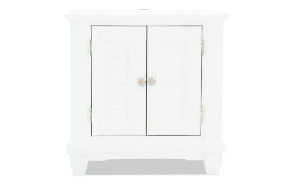 Sunset Cove White 2 Door Nightstand in coastal style, made of white MDF with slatted doors and brushed metal knobs, part of Sunset Cove Bedroom collection.