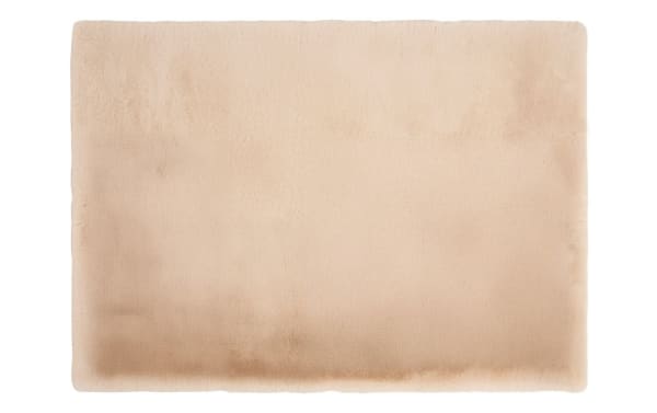 Beige Simba Luxe 8' x 10' transitional solid rug made of high-pile polyester fabric, offering plush comfort and a soft texture.