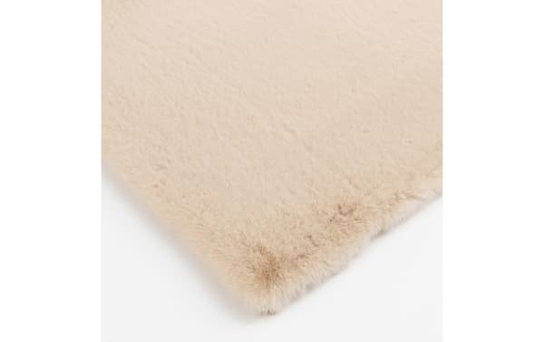 Beige Simba Luxe 8' x 10' transitional rug with high-pile soft polyester fabric, offering plush comfort and a solid color design.
