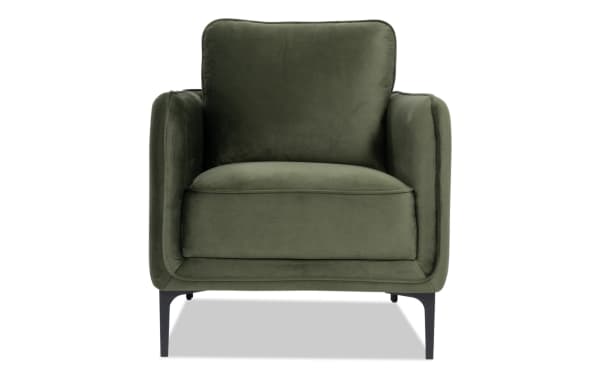 Madeline Olive Green Accent Chair in contemporary style with plush olive velvet upholstery, cushioned foam seat, and sleek black metal legs.