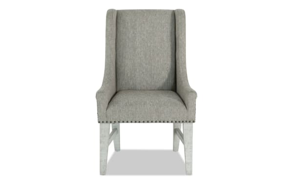 Beaumont White & Beige Solid Back Upholstered Dining Chair with beige polyester fabric, nailhead trim, pine wood legs, transitional style.