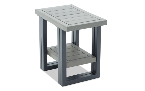 Modern outdoor side table with gray composite wood top and shelf, supported by dark gray metal frame, suitable for patio or garden use.