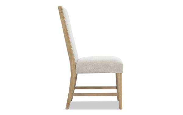 Malibu Natural & Gray Solid Back Upholstered Dining Chair with gray polyester fabric, solid acacia wood frame, and memory foam cushioning.