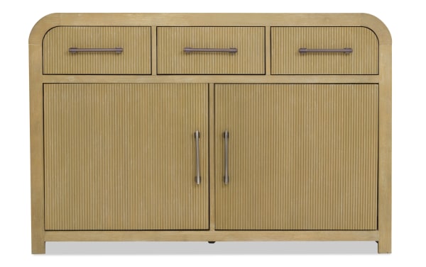 Light wood sideboard with ribbed texture, featuring three top drawers and two large cabinet doors with metal handles, modern design.