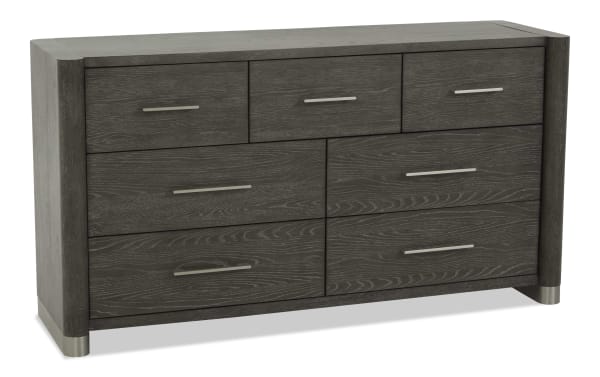 Dark gray wood dresser with six drawers, modern metal handles, rounded corners, and metal feet accents, suitable for bedroom storage.