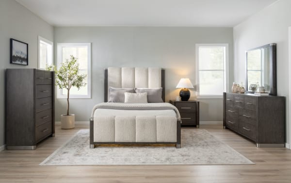 Dark wood drawer with metal handles, open to show smooth wooden interior base, highlighting storage space and modern furniture design.