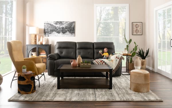 Transitional Sedona Sand leather power recliner with power headrest, memory foam, cup holders, USB/USB-C ports, and beige vinyl accents.
