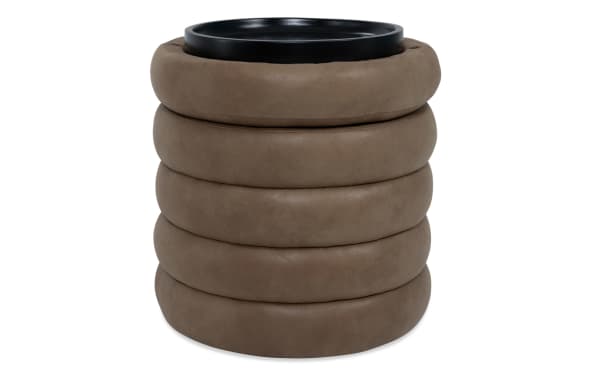 Blair Cognac Storage Ottoman in brown polyester fabric with a contemporary round, layered ring design and hidden lift-top storage for clutter.