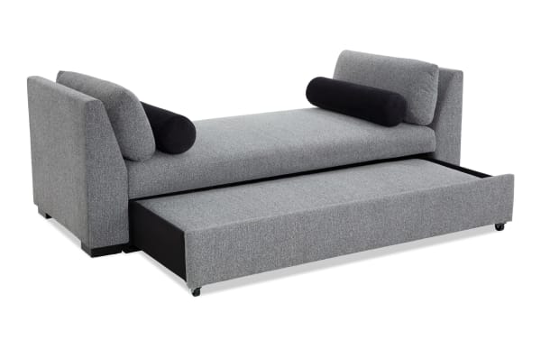 Daydreamer Gray Daybed with Pop-Up Sleeper in transitional style, gray polyester fabric upholstery, MDF frame, featuring memory foam cushion and black bolster pillows.
