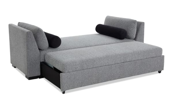 Transitional Daydreamer Gray Daybed with Pop-Up Sleeper in gray polyester fabric, featuring memory foam cushioning and a flat pop-up sleeper for versatile lounging and sleeping.