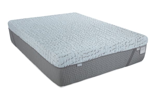 Enchant 16'' Queen Dual Mattress with plush light blue quilted top and gray textured base, featuring cooling cover and dual comfort options.