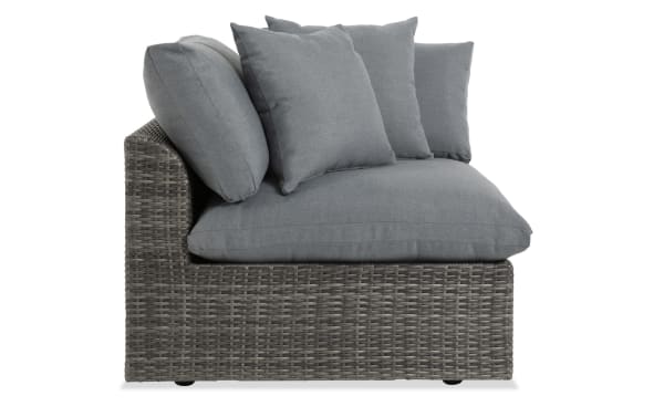 Dream Gray Wicker Outdoor Corner Chair with gray reversible cushions, all-weather wicker, aluminum frame, and polyester fabric from Dream Outdoor collection.