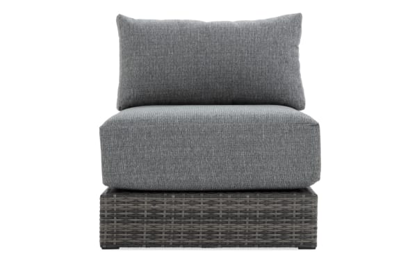 Gray Modular Bob® wicker outdoor armless chair with plush polyester cushions, all-weather wicker base, and rust-proof aluminum frame in transitional style.