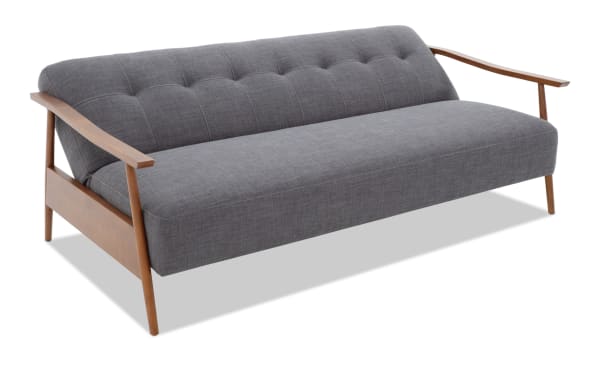 Bettie Ash Futon in gray polyester fabric with mid-century modern design, tufted back, wooden arms, and angled wood legs for stylish seating.