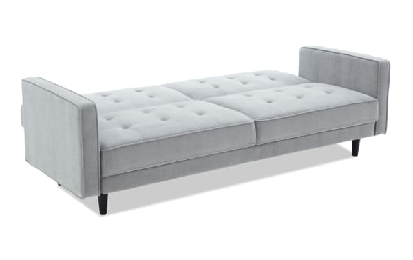 Mellow Gray Futon in gray polyester fabric with soft foam padding, transitional style, tufted cushions, and armrests on both ends, ideal for home office or guest room.