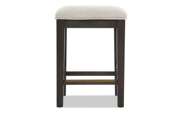 Contemporary Encore Brown & Beige backless counter height stool with beige polyester fabric, acacia veneer frame, and memory foam seat.