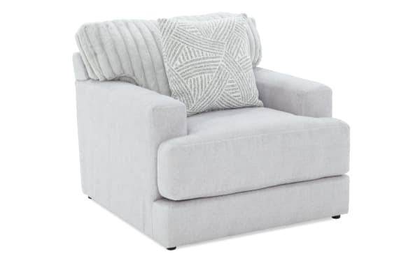 Contemporary Sofia Gray Chair upholstered in soft gray polyester fabric with channel tufted back cushions and accent pillows, featuring Bob-O-Pedic Memory Foam for enhanced comfort.