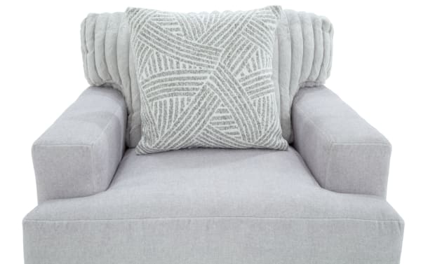 Contemporary Sofia Gray Chair with plush polyester fabric upholstery, channel tufted back cushions, and matching patterned accent pillow for luxury and comfort.