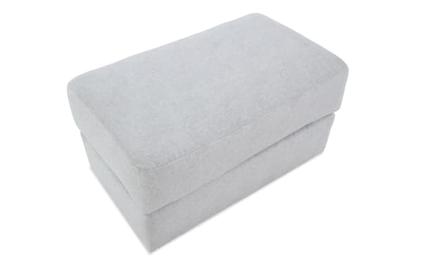 Contemporary Sofia Gray Ottoman upholstered in soft gray polyester fabric with plush memory foam cushion for extra comfort and style.