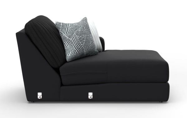 Modern black fabric chaise lounge with plush cushions, including a patterned gray and white throw pillow, designed for comfortable seating.