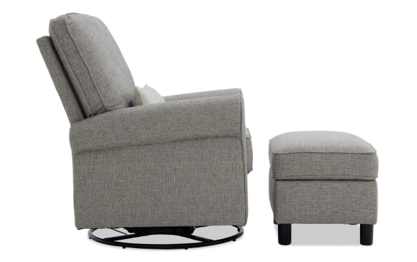Light gray Cottage Chic fabric swivel glider chair with matching storage ottoman, polyester upholstery, nailhead accents, and memory foam cushioning.
