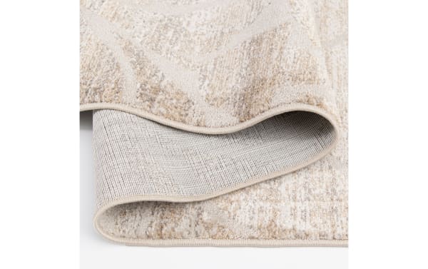Traditional Iris 8' x 10' white floral rug with a medium polypropylene pile, featuring a textured floral pattern and durable woven backing.