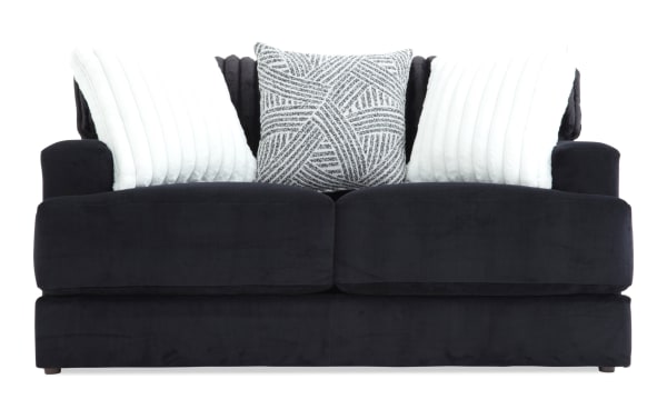 Contemporary Sofia Black 70'' Loveseat with plush black polyester fabric, channel tufted back cushions, and three accent pillows for luxury and comfort.