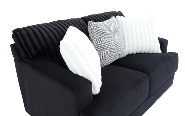 Contemporary Sofia Black 70'' Loveseat upholstered in black polyester fabric with channel tufted seat back cushions and plush accent pillows.