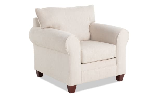 Transitional Portland Beige Chair with soft polyester fabric upholstery, memory foam cushion, rolled arms, and wooden legs for comfortable seating.