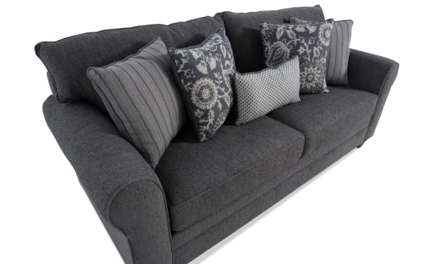 Portland Gray 85'' sofa in soft gray polyester fabric with transitional style, featuring rolled arms and five decorative accent pillows.