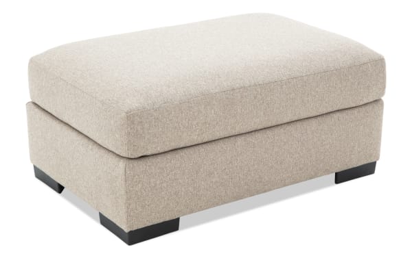 Transitional Camden Gray Ottoman upholstered in soft gray polyester fabric with Bob-O-Pedic memory foam cushion, sturdy block feet.