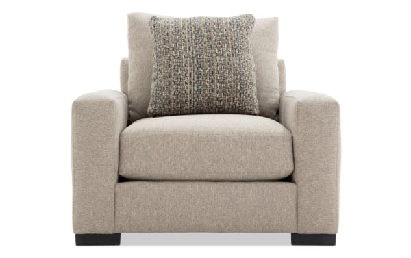 Camden Gray Chair in transitional style with gray polyester fabric upholstery, memory foam cushion, and patterned accent pillow for comfort and style.