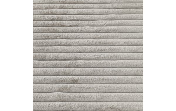 Light gray Sofia 5' x 7' transitional rug with ultra-plush medium pile polyester fabric, soft and washable for cozy barefoot comfort.