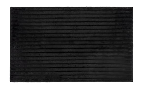 Black Sofia 2' x 4' transitional solid washable rug with ultra-plush polyester fabric and medium pile for soft, cloud-like comfort.