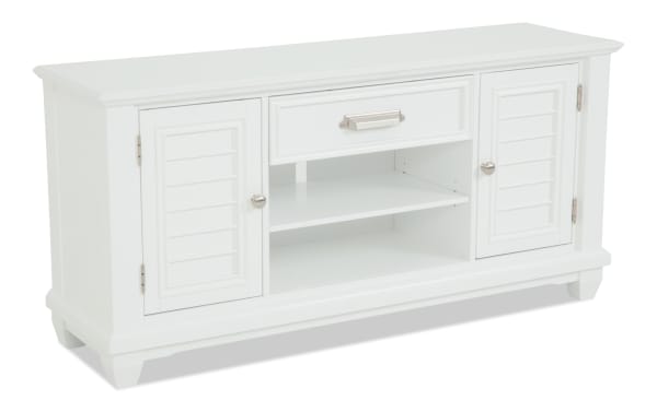 White wooden TV stand with two cabinets, a central drawer with silver handle, and two open shelves, featuring a classic design and silver knobs.