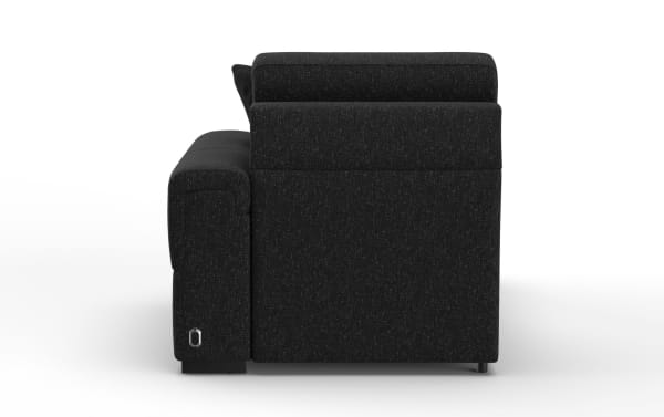 Black fabric upholstered sofa side view showing a modern design with a cushioned armrest and a metal power outlet switch on the lower side.