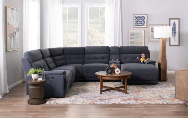 Contemporary Rumor Blue Power Recliner sectional in blue polyester fabric with power headrest, USB ports, cushion arms, and memory foam seating.