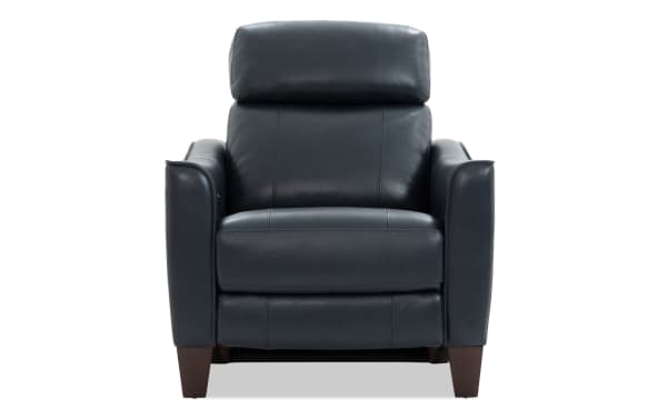 Black leather recliner chair with padded armrests, cushioned backrest, and wooden legs, designed for comfort and modern living rooms.