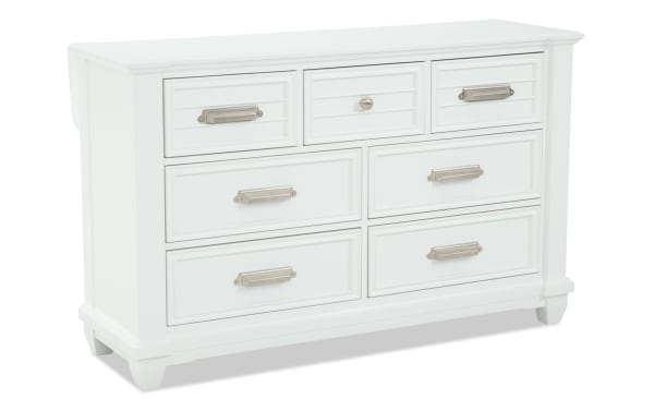 Sunset Cove Youth White 7 Drawer Dresser in coastal style, made of white MDF with seven smooth-gliding drawers, including a felt-lined top drawer.