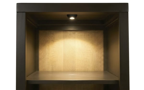 Tall dark brown wooden shelving unit with a built-in overhead light and a natural wood back panel, suitable for home or office storage.