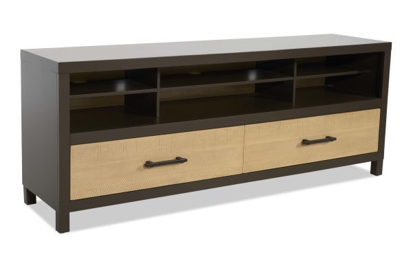 Modern TV stand with dark brown frame and light wood drawer fronts, featuring two drawers with black handles and open shelving for media devices.