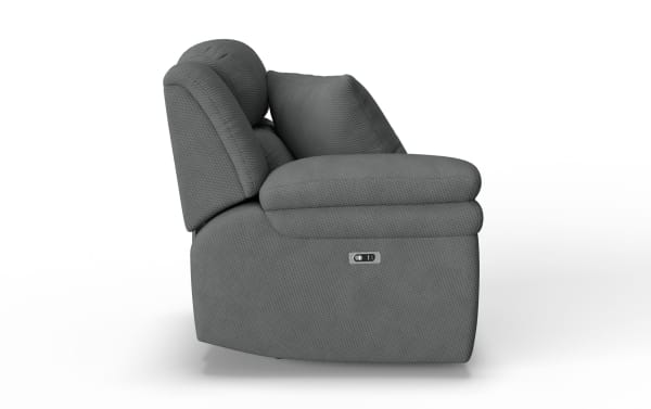 Gray fabric recliner chair with cushioned armrest, tufted backrest, and side control panel for reclining adjustment, shown from side view.