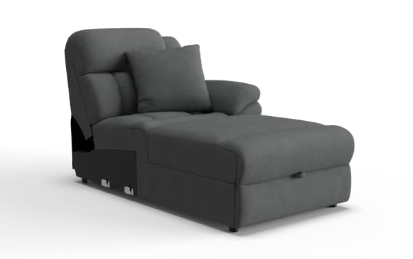 Dark gray upholstered chaise lounge with cushioned backrest, armrest, and matching throw pillow, featuring a textured fabric and modern design.