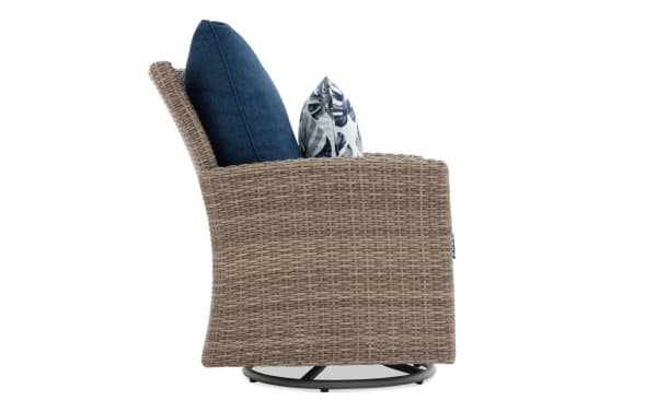 Outdoor swivel chair with beige woven rattan frame, blue and white patterned cushions, designed for patio comfort and style.
