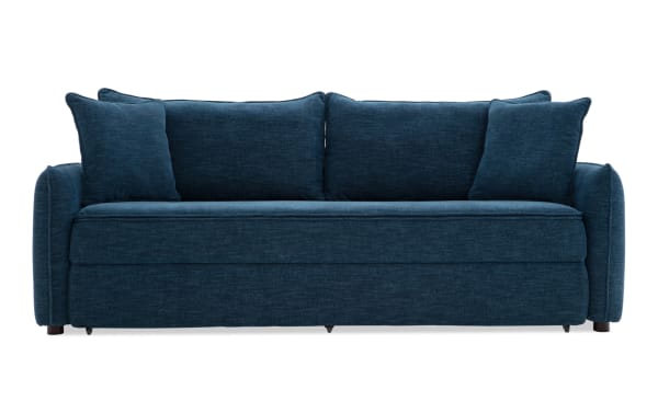 Modern navy blue fabric sofa with plush cushions and two matching throw pillows, featuring a sleek, contemporary design ideal for living rooms.