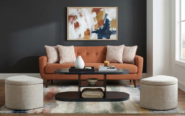 Contemporary Hampton Entertainment & Occasional gray oval storage coffee table in MDF with fabric polyester nesting footrests, spacious shelving, and hidden storage.